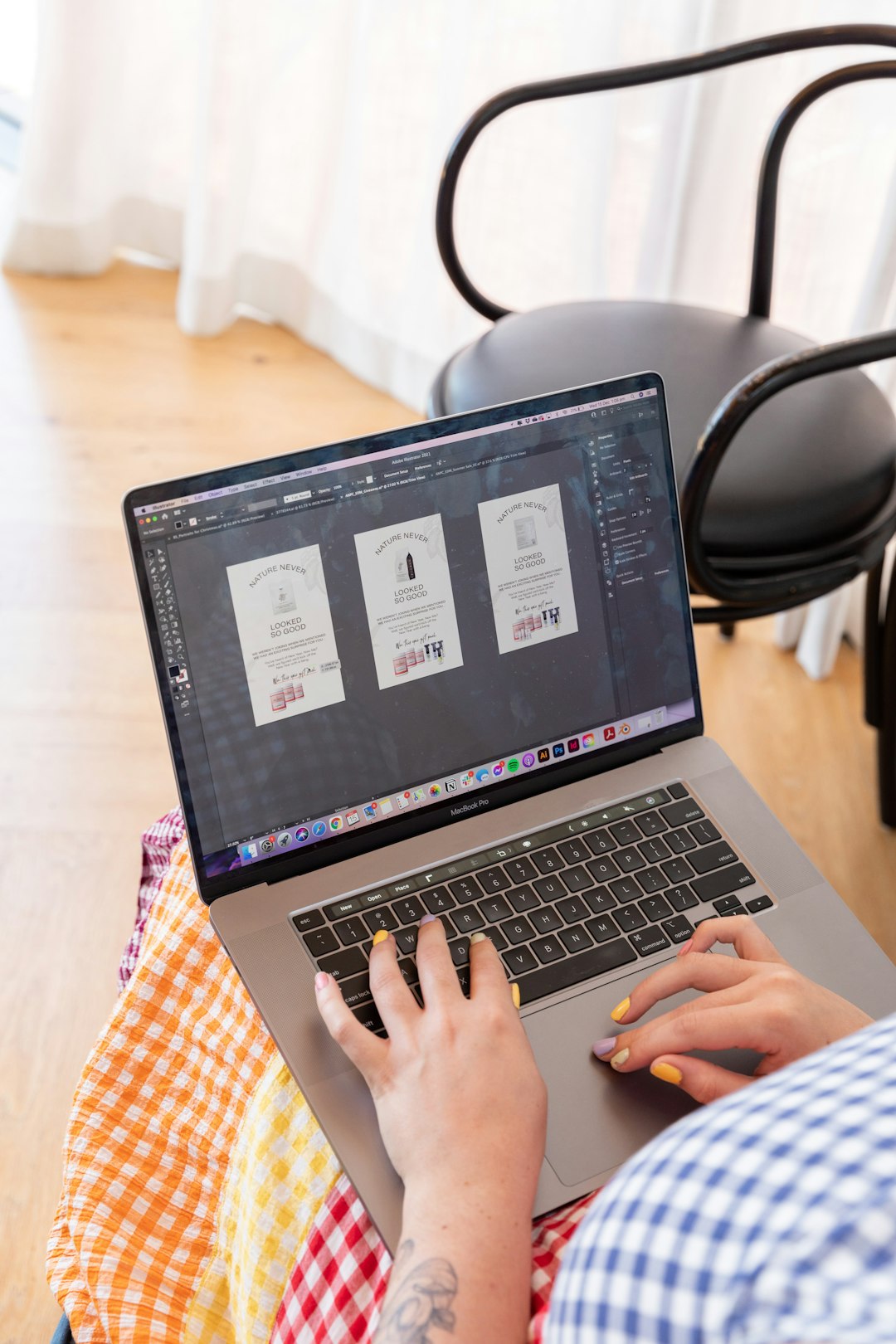 home-hero a-person-sitting-in-a-chair-using-a-laptop-computer-y-9mibp3oku